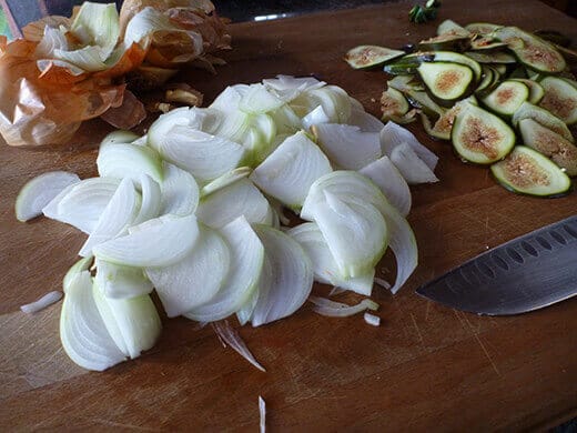 Roasted Fig Pizza with Caramelized Onion and Goat Cheese Slice onions into thin strips