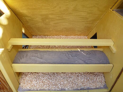 Aloha to the New Tiki Coop! Pine shavings and diatomaceous earth inside the coop