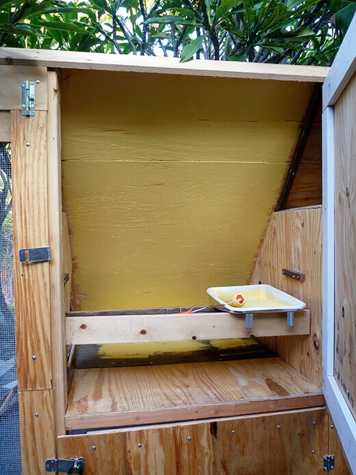 The Nuts and Bolts of the Tiki Coop Interior of the coop painted with a semi-gloss yellow paint