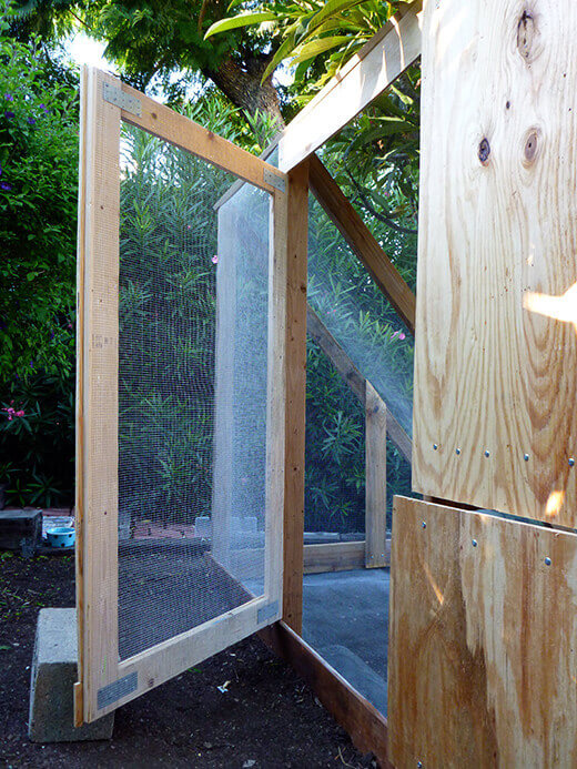 The Nuts and Bolts of the Tiki Coop Main door assembled from scrap wood