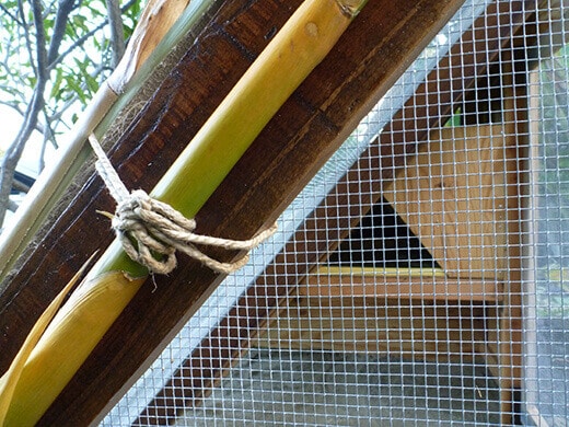 The Nuts and Bolts of the Tiki Coop Bamboo and jute decoration