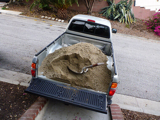 The Nuts and Bolts of the Tiki Coop Hauling home bulk sand