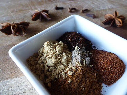 Ground cardamom, ginger, cinnamon, cloves, and star anise