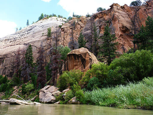 Kayak Camping on the Rio Chama Sandstone formations in the canyon