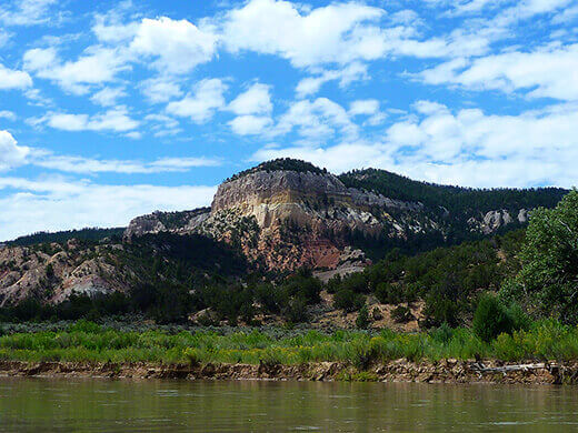Kayak Camping on the Rio Chama Striated cliffs in the canyon