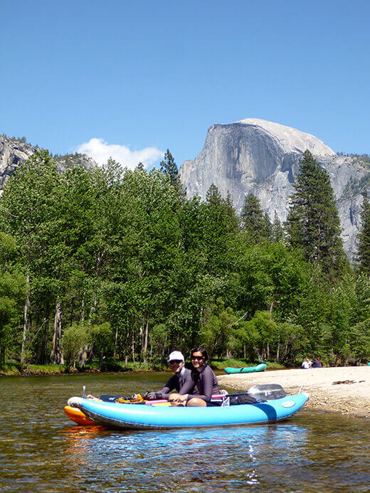 Floating Through Yosemite Valley on the Merced Kayakers in front of Half Dome