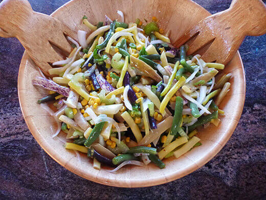 Three Bean Summer Salad Toss the salad with dressing