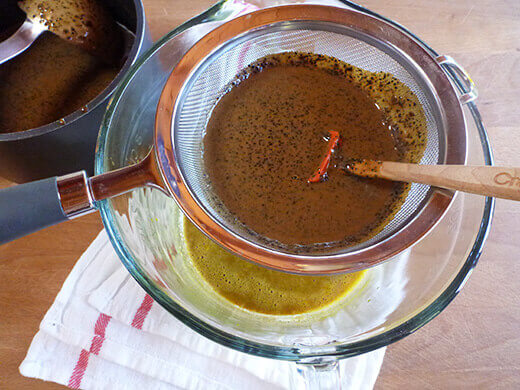 Vietnamese Coffee (Cà Phê Sữa) Ice Cream Strain cream mixture into egg yolks