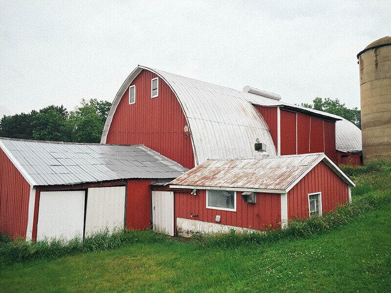 Why Are Barns Traditionally Red? Garden Betty