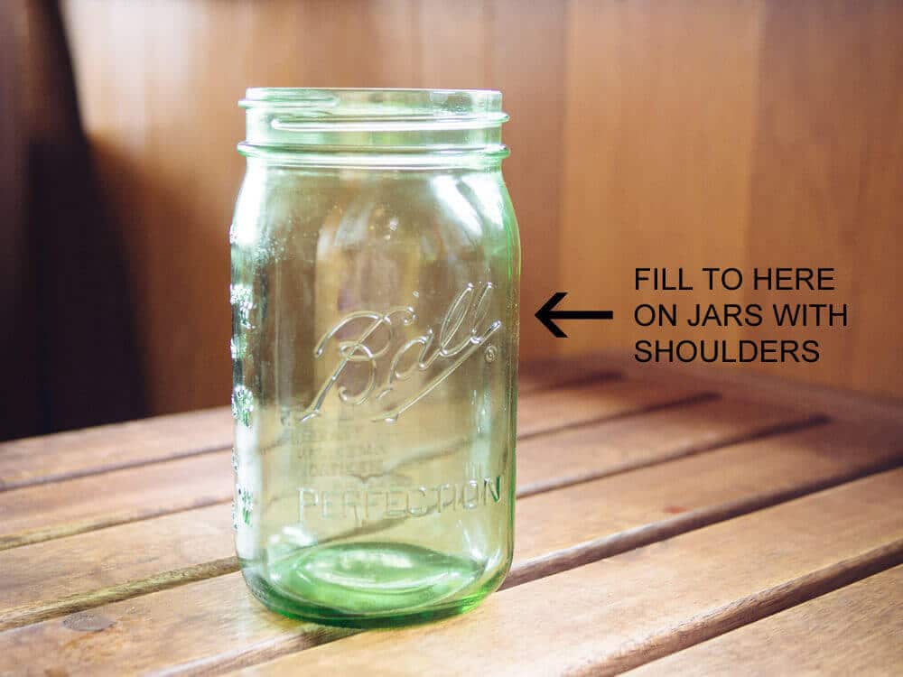 How to Safely Freeze Liquids in Mason Jars 5 Fill quart jars to no more than 1 inch below the shoulders