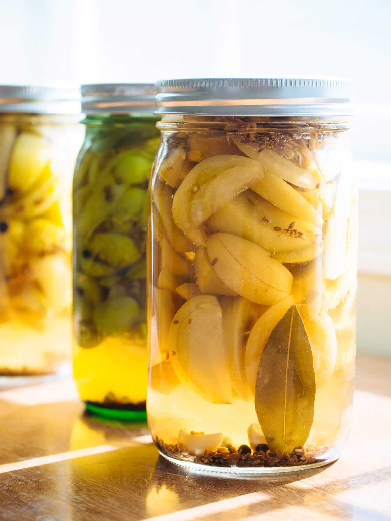 Jar of pickled green tomatoes