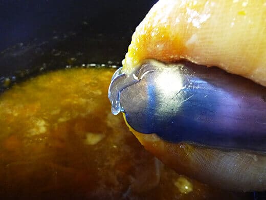 Use tongs to squeeze out natural pectin
