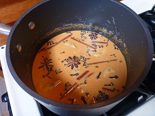Scald the mixture and steep spices in the chai for 30 minutes