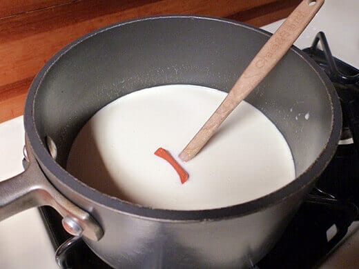Heat heavy cream and sweetened condensed milk