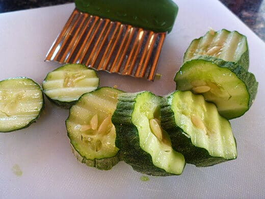 Slice cucumbers with fancy criss-cut knife