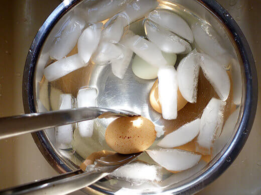 Plunge hard-boiled eggs into an ice bath