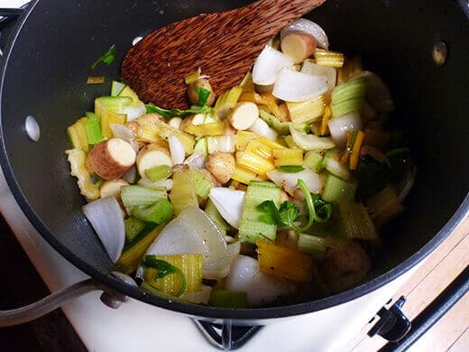 Combine onion, celery, potatoes, and chard stems