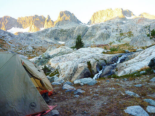 Waking up to the alpine glow of sunrise