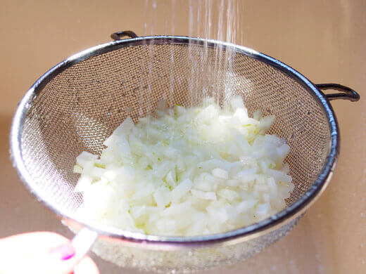 Run chopped onions under cold water to tone down rawness