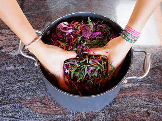 Press down on the vegetables to release more liquid