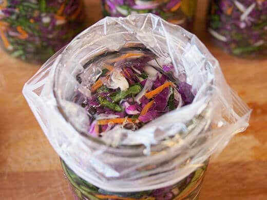 Water weight inside sauerkraut jar