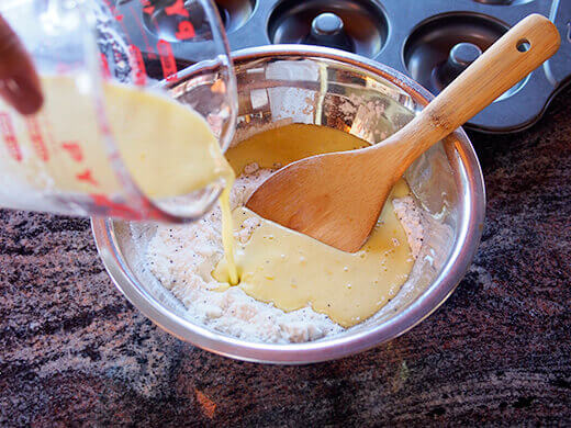 Pour wet ingredients into dry ingredients