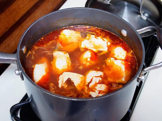 Add spoonfuls of tofu to the stew