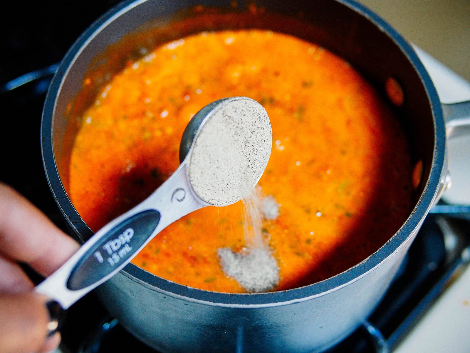 Add ground black pepper