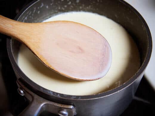 Heat up the custard to thicken