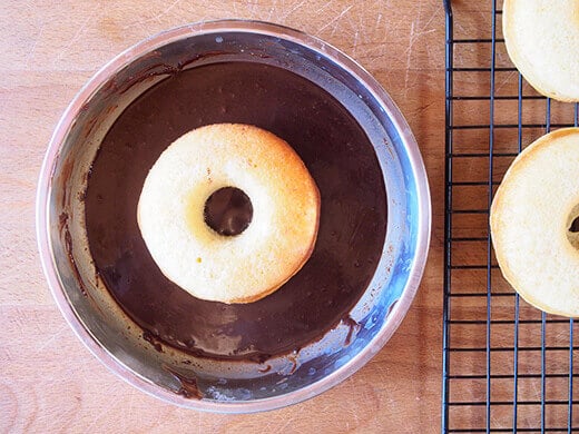 Dip each donut in glaze