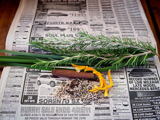Bundle up spices and herbs in newspaper