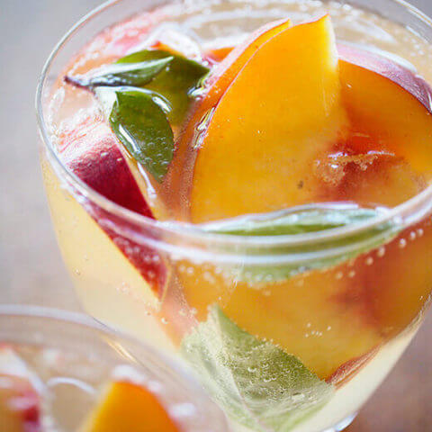 Sparkling summer sangria with lemongrass, ginger and peach