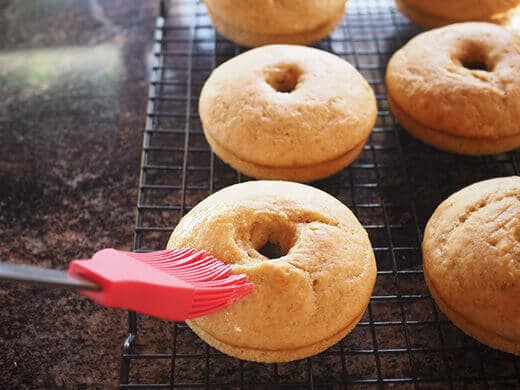 Brush donuts with melted butter