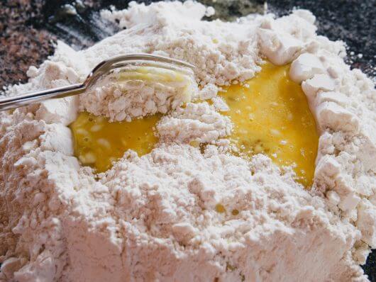 Add flour to the egg mixture