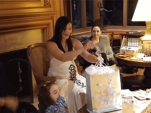 Opening gifts at my baby shower
