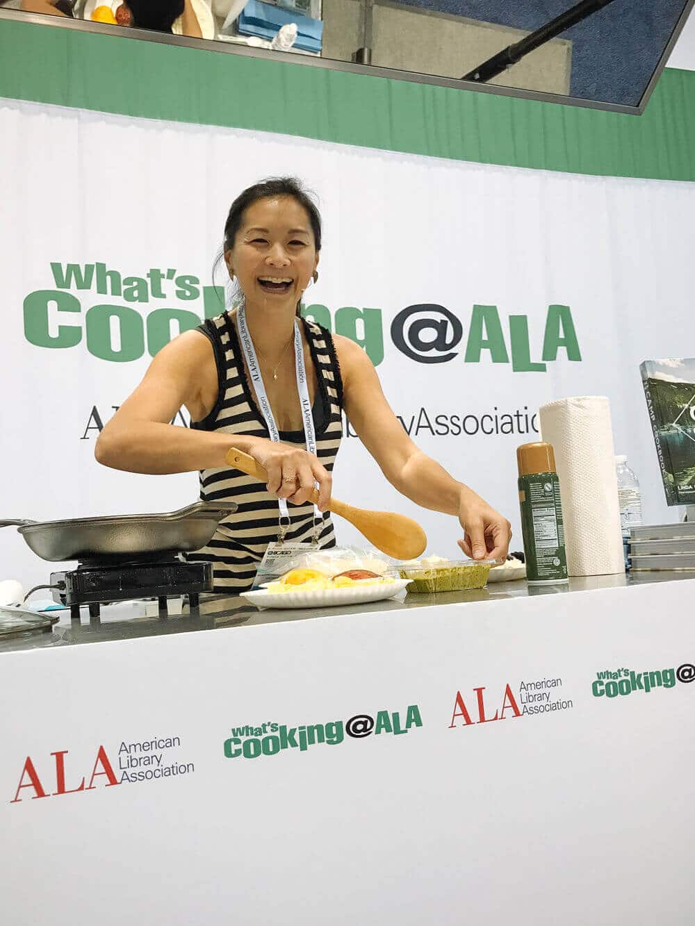 Cooking up a stovetop skillet pizza on the ALA Demonstration Stage