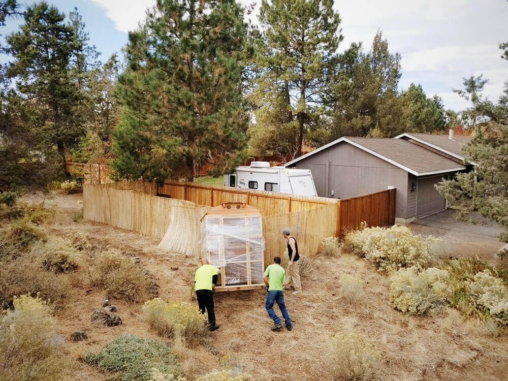 Moving the new chicken coop into place