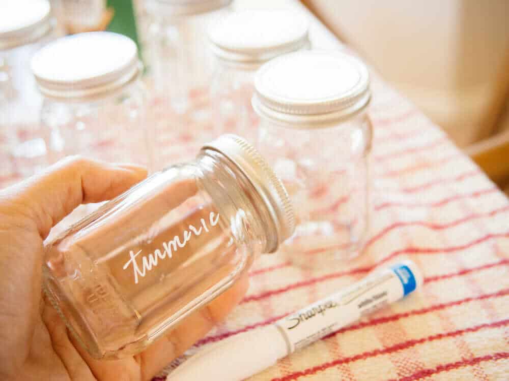 Labeling glass jars with a paint pen