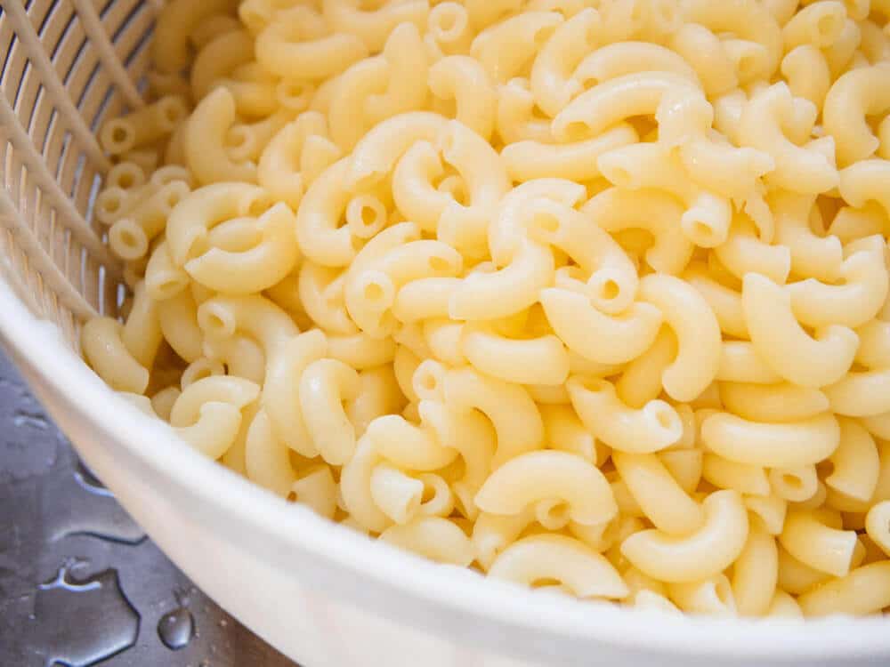 Slightly overcooked macaroni noodles soak up tons of flavor