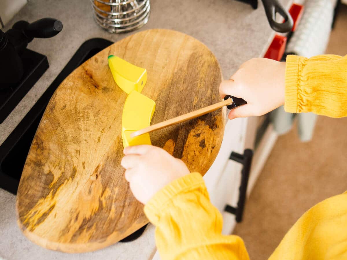 Magnetic play food are the best for toddlers learning how to "cut" food