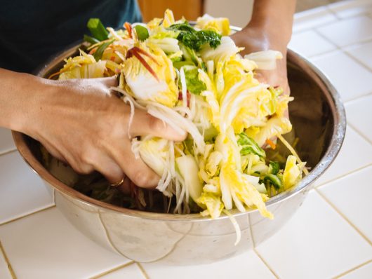 Combine all of the vegetables in a large bowl