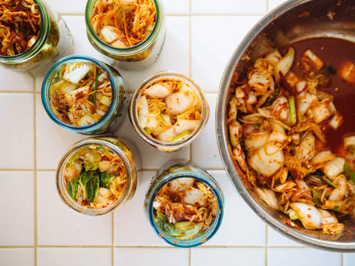Transfer the kimchi to clean jars