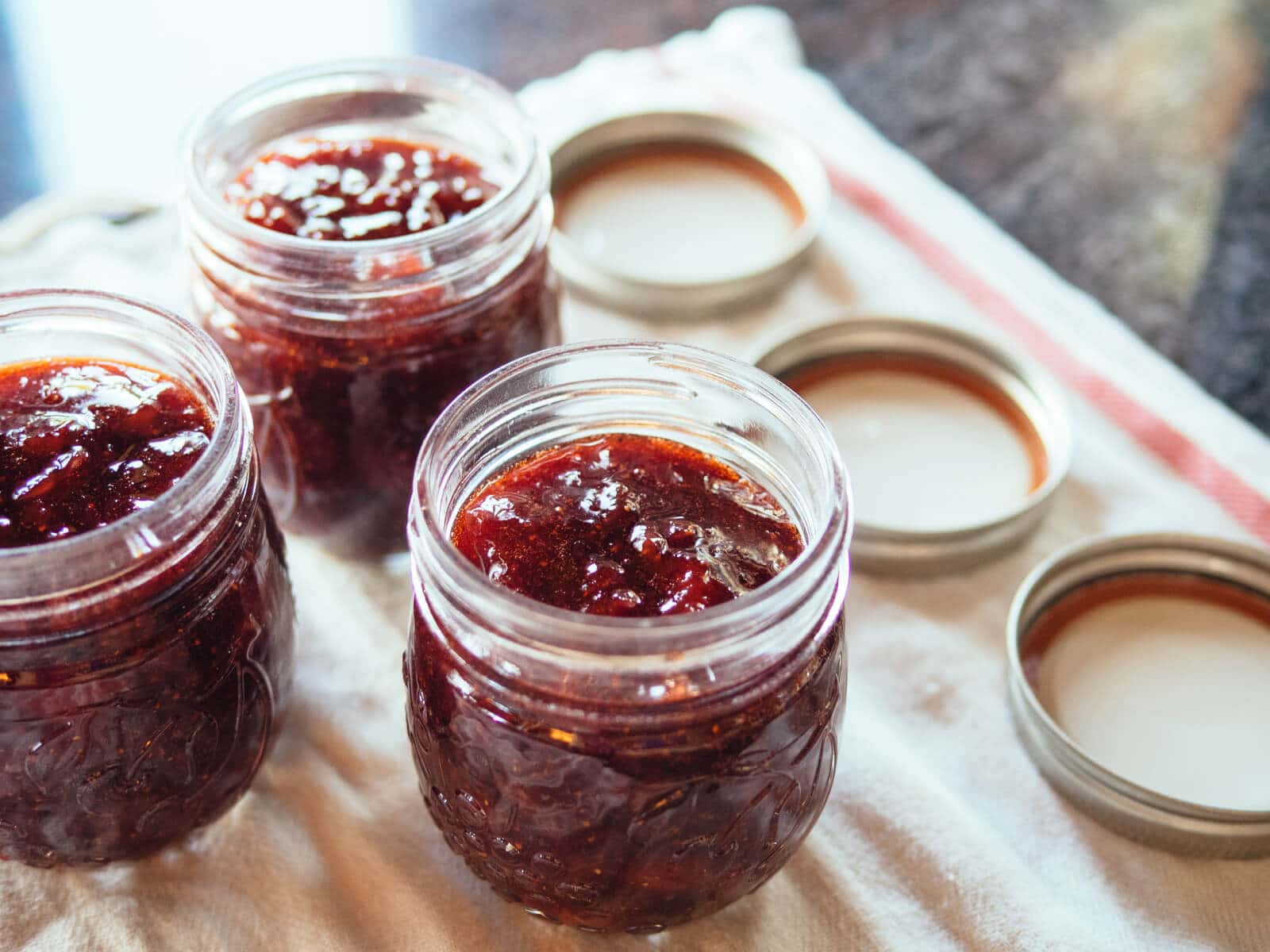 You don't need to preheat lids before canning