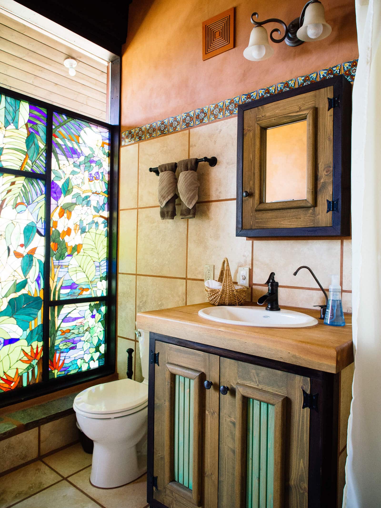 Stained glass windows in an Earthship