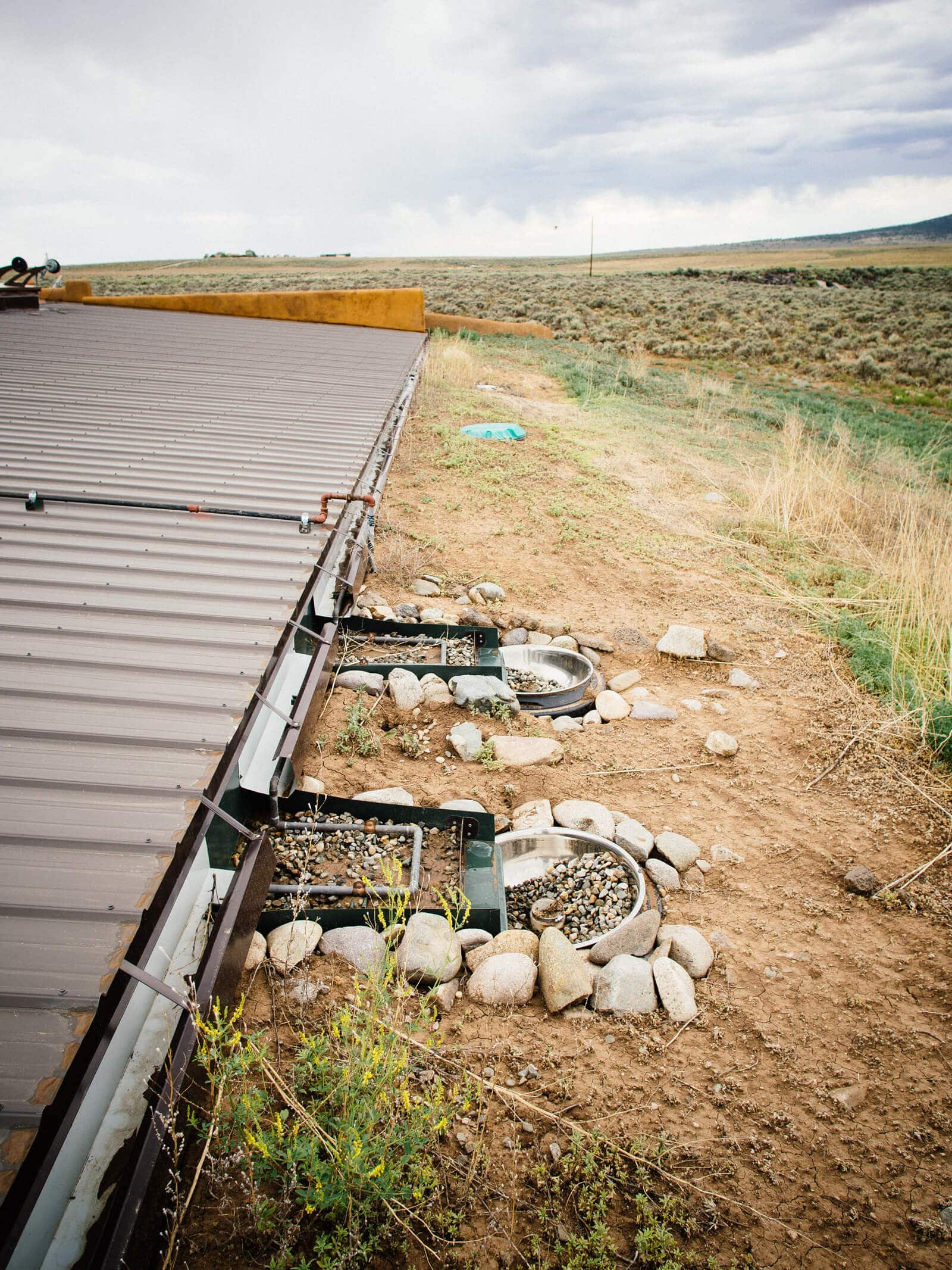 Water collection and filtration system in an Earthship