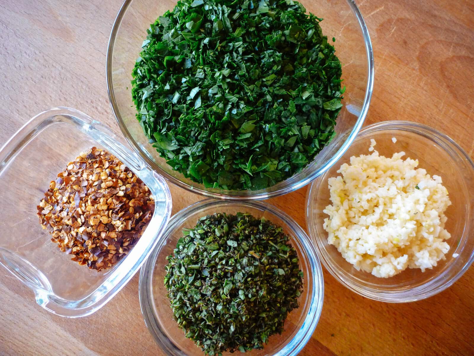 Finely chopped parsley, garlic, oregano, and red pepper flakes