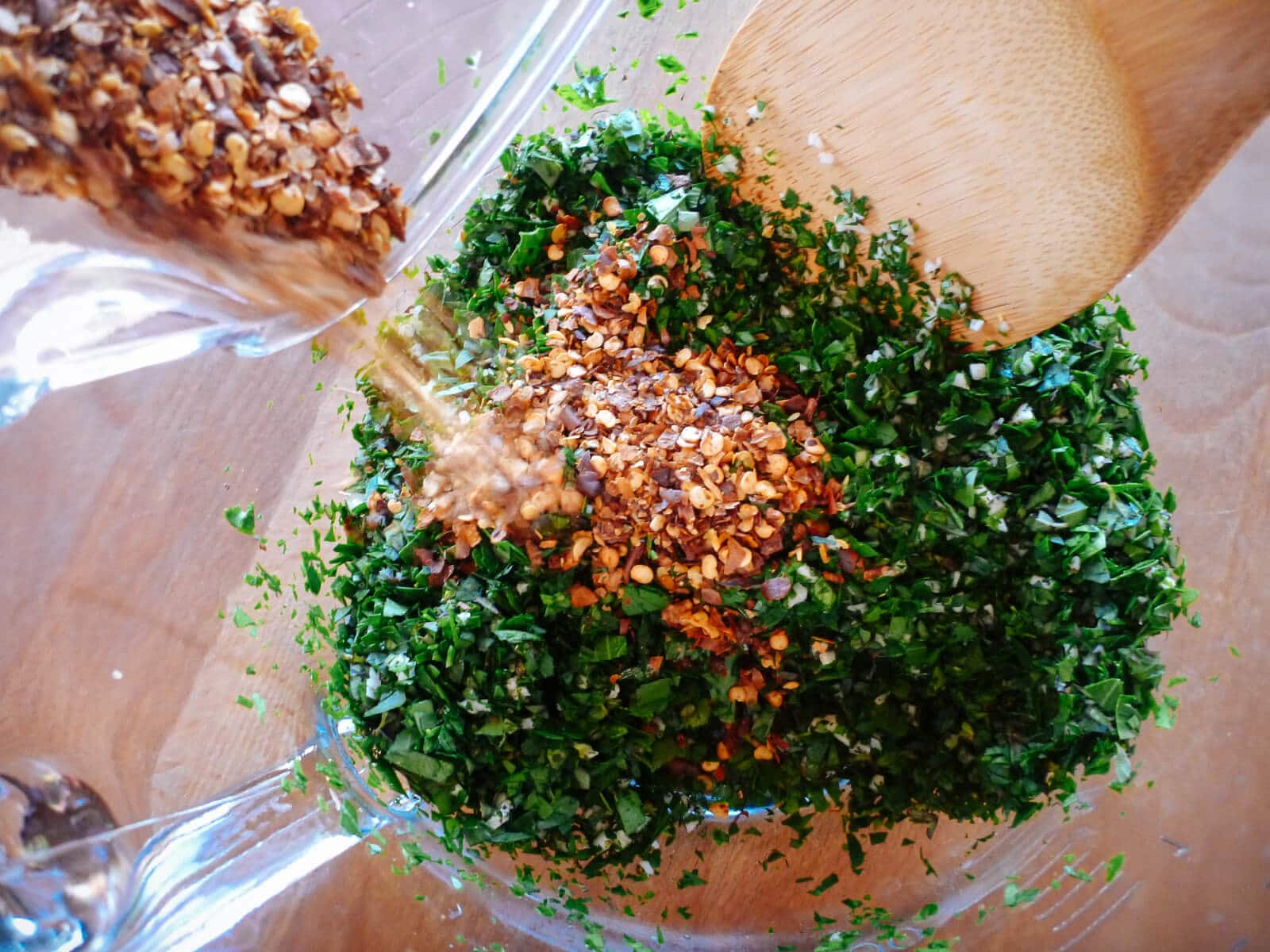 Combine all of the chimichurri ingredients in a bowl
