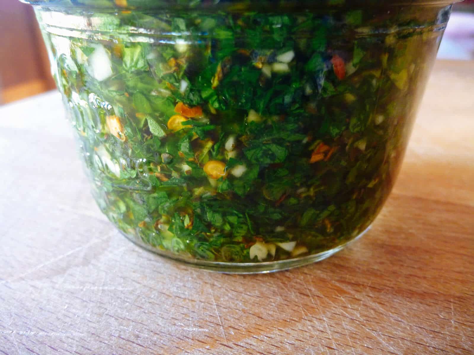 The best chimichurri is a deep army green, so don't be afraid to let the sauce age