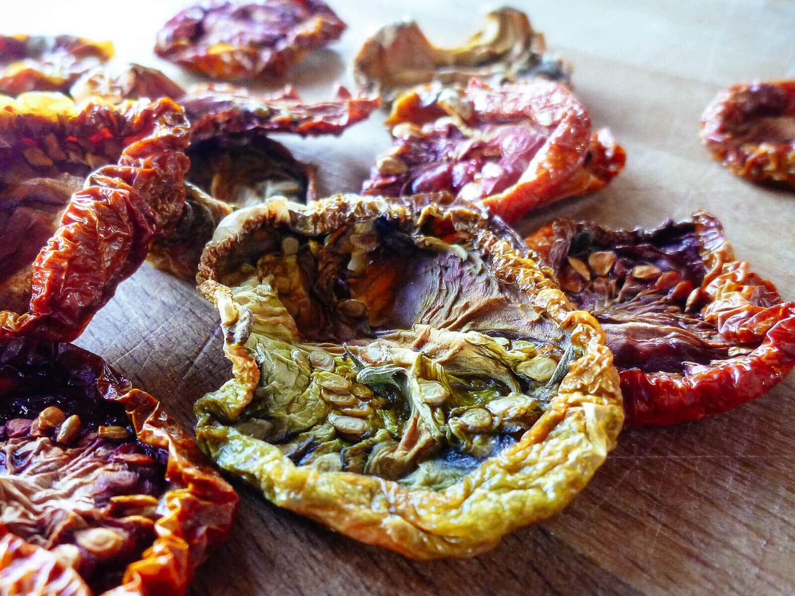Close-up of oven-dried green and red heirloom tomatoes