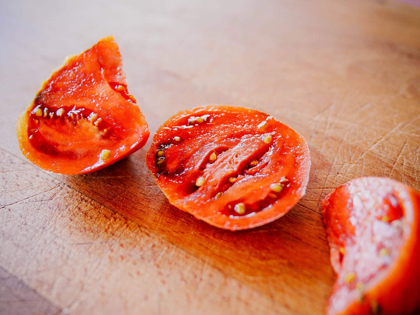 Slices of tomato showing seeds and pulp inside